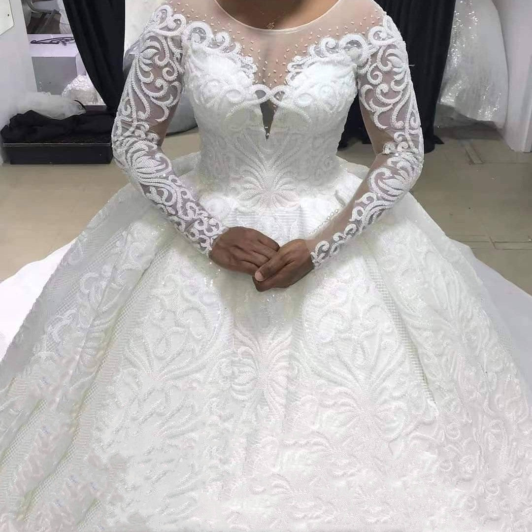 Enchanted Princess Ball Gown Wedding Dress with Elegant Long Sleeves